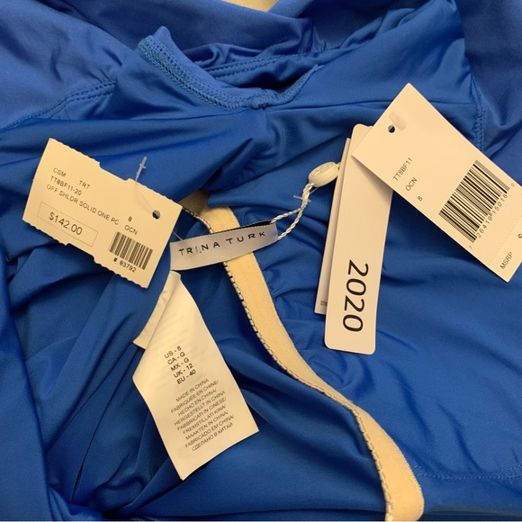 NWT Trina Turk off the shoulder ruffle one piece blue size 8

13 - Picture 14 of 14